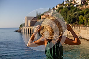 Travelling to Alanya. Backview portait of a young fit female in