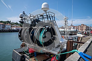 Trawler with fish nets at the port