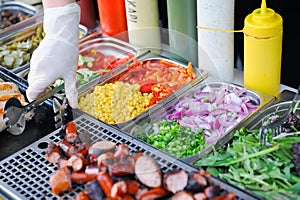Tray with cooked food on showcase