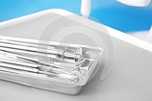 Tray with dental tools on table, closeup