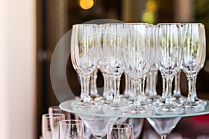 Tray with empty glasses of champagne