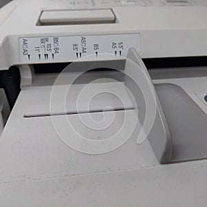 tray for entering and exiting paper on copiers