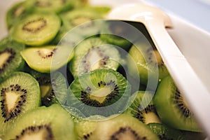 Tray filled with sliced fresh kiwi fruit