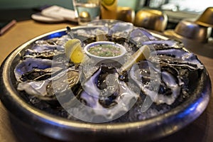Fresh shucked oysters at a resaurant photo