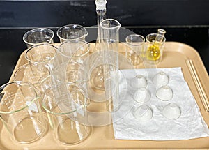 Tray of glass beakers ready for science experiments