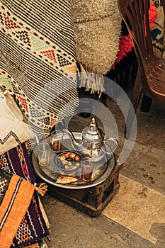 Tray with olives and drinks on it outdoors in the Habous District, Casablanca, Morocco photo