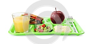 Tray with tasty food and juice on white background. School lunch