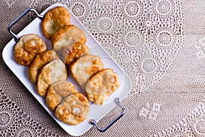 Tray of traditional fried Turkish pisi halka photo