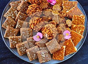 Indian sweets - Tray full of winter Diwali sweets chikki photo