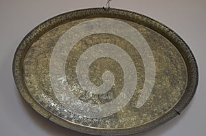Bronze tray with patterns.