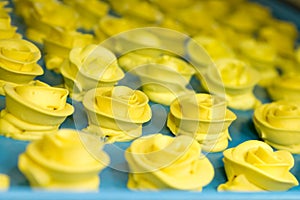 A tray of Yellow Buttercream Roses