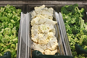 Trays with different vegetables photo