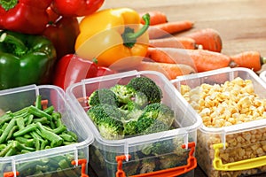 Trays with raw vegetables for freezing.