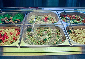 Trays with ready food in a Russian cuisine canteen
