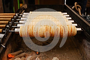 Trdelnik or chimney cake baked on the street in Eastern Europe