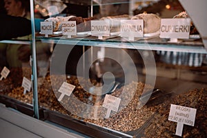 Trdelnik, traditional czech and european sweet street food, process of baking and cooking on street food festival market