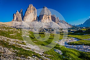 Tre Cime di Lavaredo with green grass, summer, Dolomites Alps