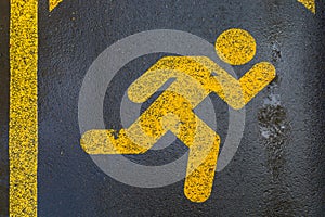 A treadmill sign on the pavement that is for running, walking or jogging only.