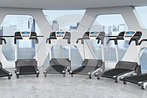Treadmills in Interior of Modern Gym Room Fitness Center with Bi