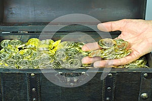 Treasure chest filled with gold coins