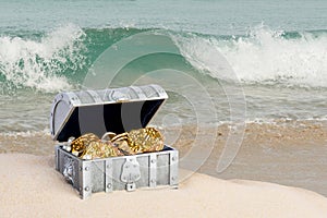 Treasure chest from pirates with gold coins nuggets