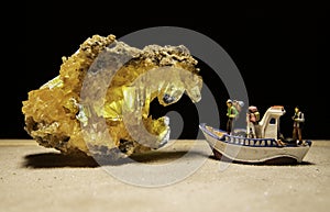 Treasure hunter and tourist find the yellow crystal stone