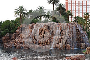Treasure Island Hotel and Casino, water, rock, arecales, tree photo