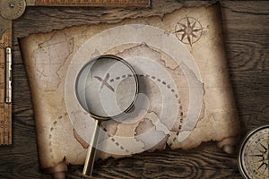 Treasure map on wooden desk with compass 3d illustration