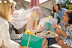 Treasured Surprises: Bride-to-Be Receiving Gifts from Her Beloved Friends