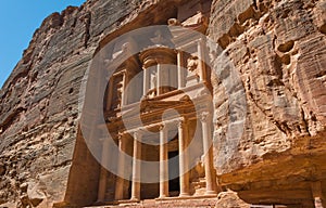 The treasury building carved into the rock face at Petra in Jor