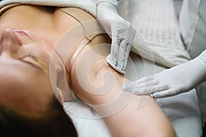 Treat skin before electrolysis in beauty clinic