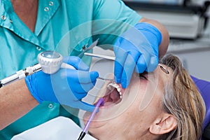 Treatment of gingivitis at the dentist photo