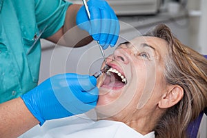 Treatment of gingivitis at the dentist photo