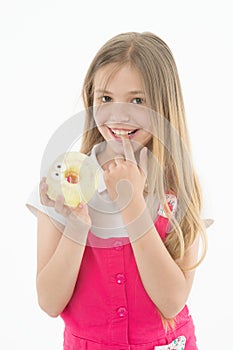 Treats for holidays. Kid rewarded for good behavior with sugary treats. Girl cute smiling face holds sweet donut. Girl photo