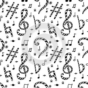 Treble and bass clefs  flat  sharp  natural and notes. Seamless pattern of musical symbols