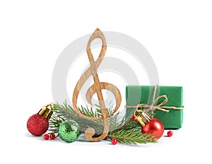 Treble clef with decorations isolated on . Christmas music concept