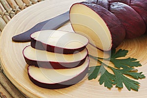 Treccia braided Mozzarella cheese marinated in red wine