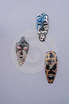 Tree black tribal mask on wall