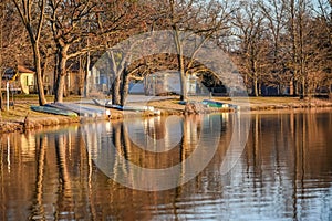 Tree and Boat Reflections on Lake