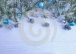 Tree branch, ball gift design greeting seasonal decorative on white wooden background, snow