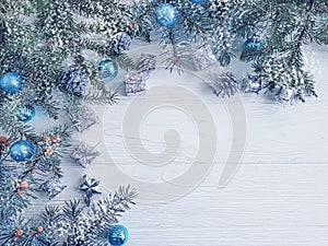 Tree branch, ball gift design decorate december frame seasonal decorative on white wooden background, snow