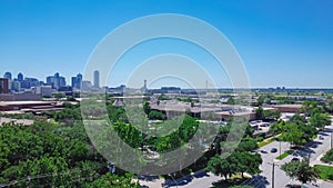 Tree canopy cover green Wycliff Ave in Stemmons Corridor or Lower Stemmons neighborhood, downtown Dallas skylines