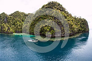 Tree-Covered Limestone Islands in Raja Ampat photo