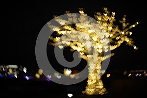 Tree of golden hearts lights. Beautiful valentines day background