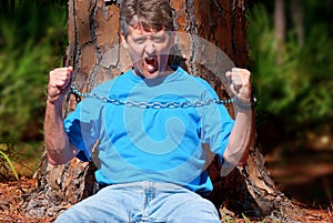 Tree hugger protesting deforestation