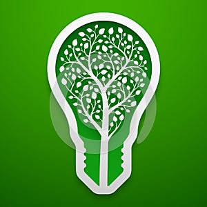 Tree within lightbulb shape. Paper art for the Earth Day decoration. Vector illustration of ecological idea. Concept design