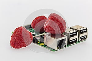 tree raspberries and circuit board with rj45, hdmi and usb connectors