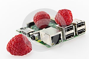 tree raspberries and circuit board with rj45, hdmi and usb connectors