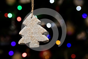 Tree shape of Christmas ornaments hanging on Christmas tree