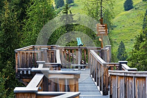 Tree-top walk in Saalbach-Hinterglemm valley, Alps Mountains, Austria, summer day